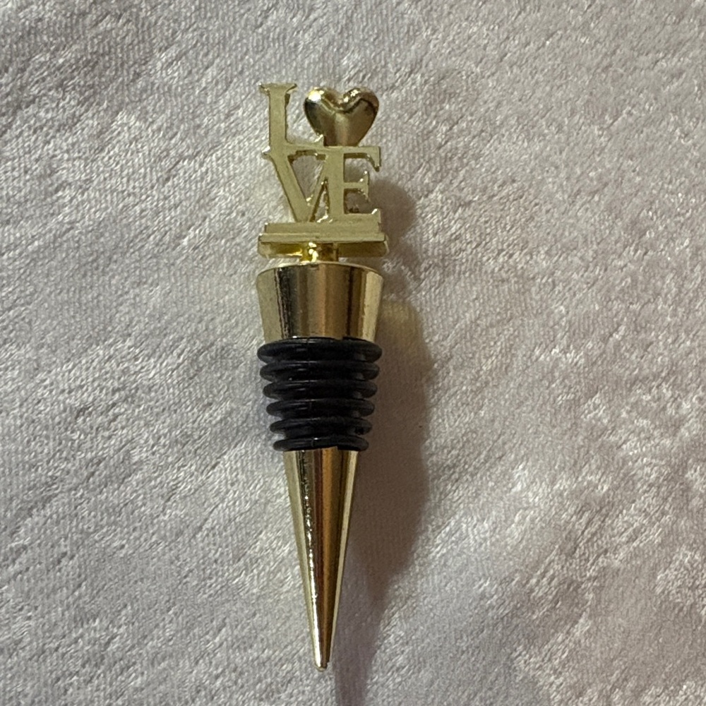Gold/black “Love” Wine Stopper like new!